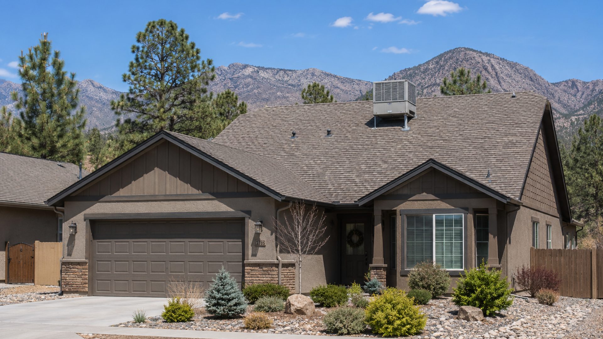 roof-restoration A rooftop AC unit on top of a residential home with asphalt shingles in Northern Arizona.
