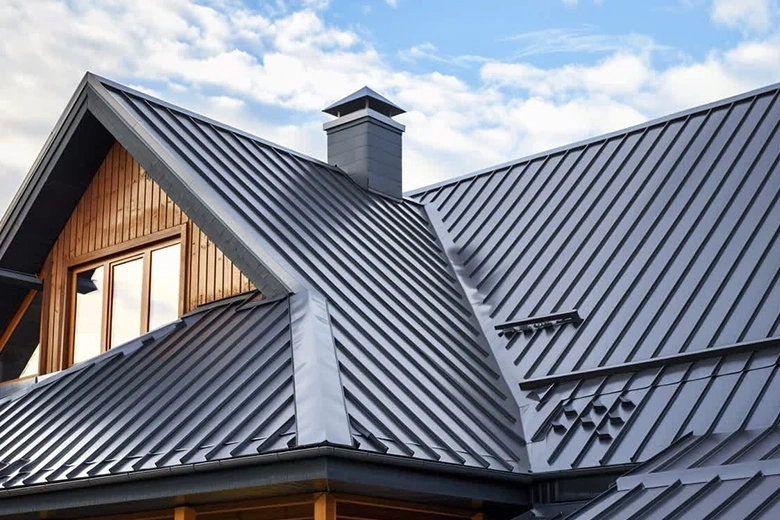 Asphalt shingles curling and lifting from age and UV damage
