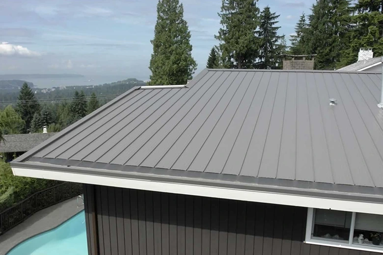 Vent pipe boot flashing sealed on an asphalt shingle roof