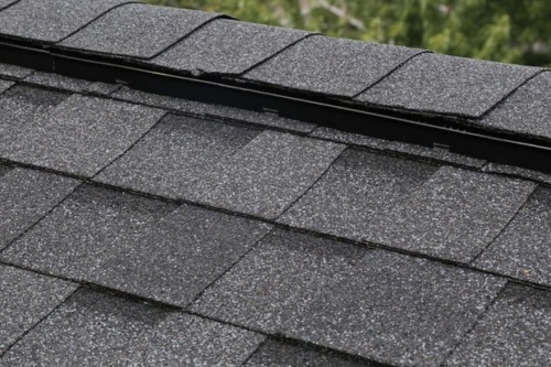 Roof leak water dripping Water dripping from a roof during an active roof leak