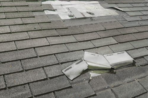 Roof leak water dripping Water dripping from a roof during an active roof leak